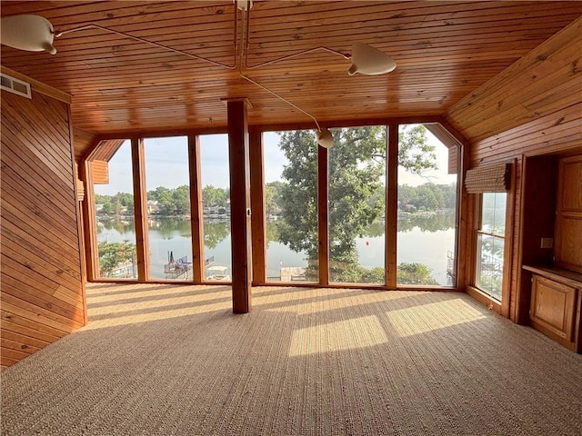 27 Beach Dr, Lake Tapawingo, MO 64015 - unfurnished sunroom featuring a water view