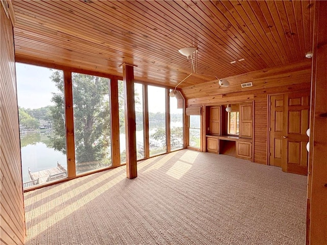27 Beach Dr, Lake Tapawingo, MO 64015 - unfurnished sunroom featuring plenty of natural light