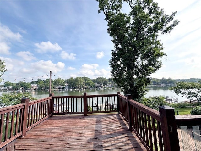 27 Beach Dr, Lake Tapawingo, MO 64015 - wooden terrace with a water view