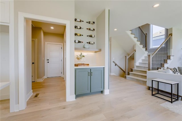 2202 W 178th Ter, Overland Park, KS 66085 - stairs with wood finished floors, baseboards, and recessed lighting