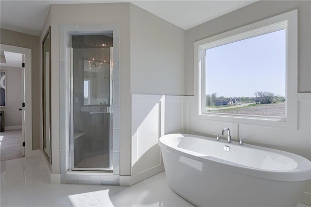 2202 W 178th Ter, Overland Park, KS 66085 - bathroom featuring a shower stall and a soaking tub