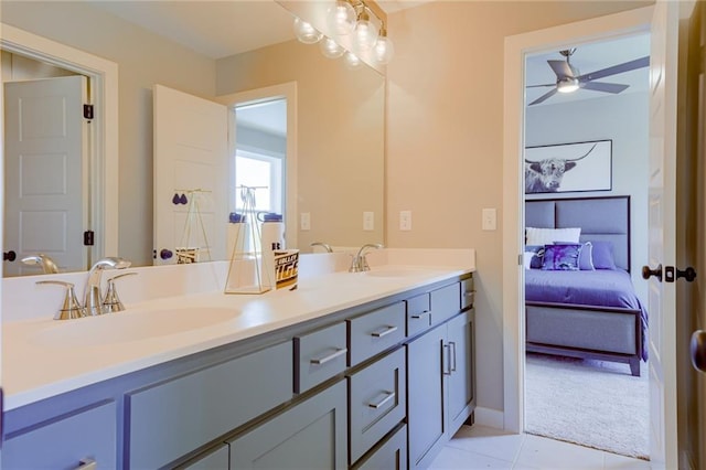 2202 W 178th Ter, Overland Park, KS 66085 - ensuite bathroom featuring double vanity, ceiling fan, and tile patterned flooring