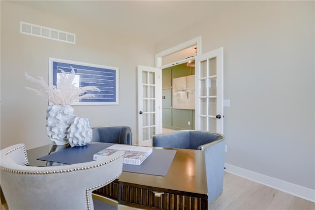 2202 W 178th Ter, Overland Park, KS 66085 - home office featuring french doors, wood finished floors, and baseboards