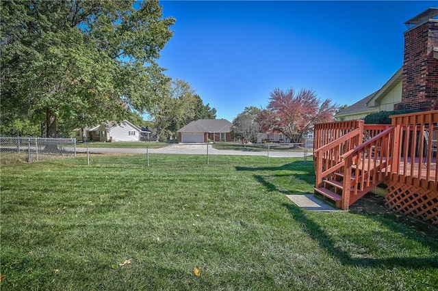 view of yard featuring a deck