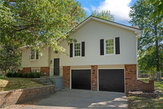 split foyer home featuring a garage