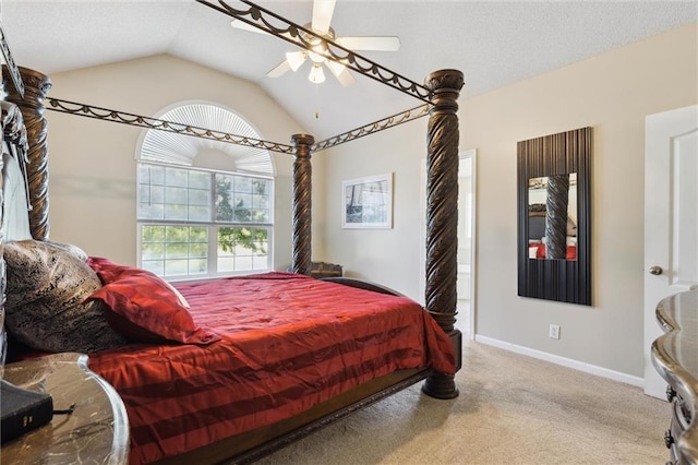 bedroom with ceiling fan, carpet, and lofted ceiling