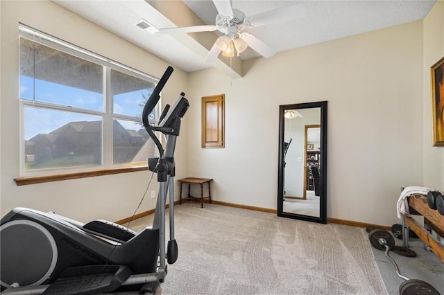 exercise area with light colored carpet and ceiling fan