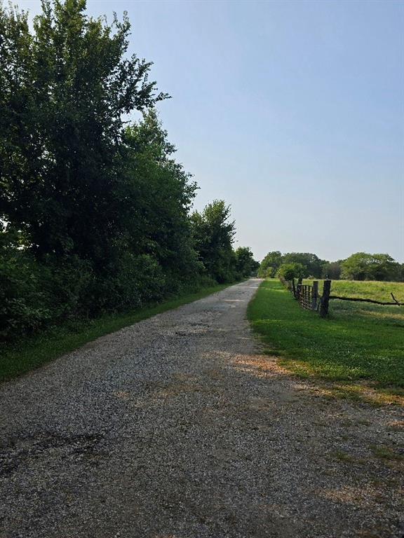 view of road with a rural view