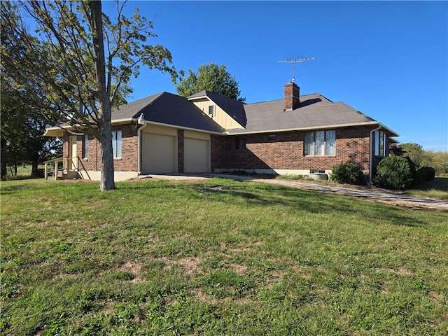 ranch-style home with a garage and a front lawn