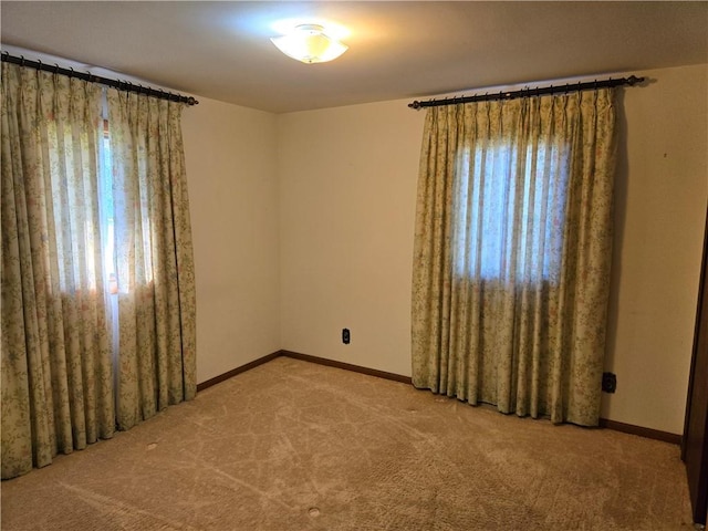 view of carpeted spare room