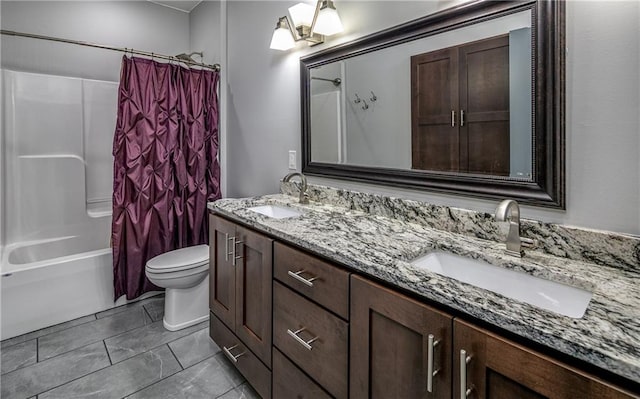 full bathroom with toilet, vanity, and shower / bathtub combination with curtain