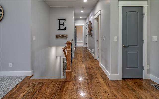 hallway featuring hardwood / wood-style floors