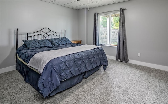 bedroom featuring a drop ceiling