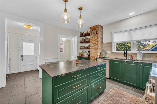 kitchen with a kitchen island, green cabinets, backsplash, and dishwasher