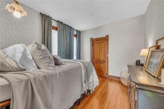 bedroom with light hardwood / wood-style floors