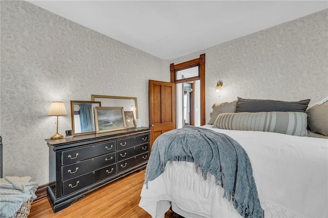 bedroom featuring hardwood / wood-style floors