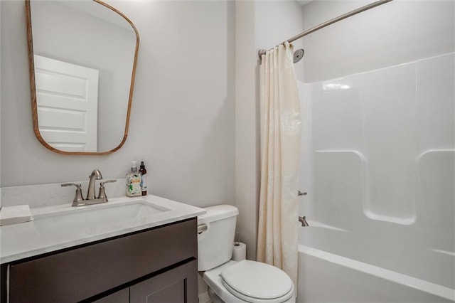 full bath with toilet, shower / bath combination with curtain, and vanity