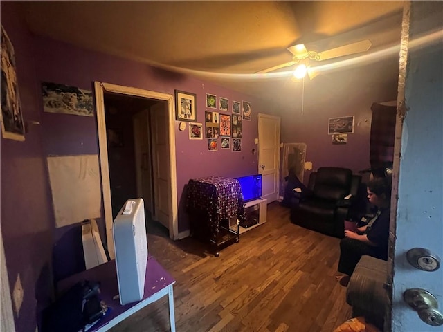 interior space featuring ceiling fan and wood-type flooring