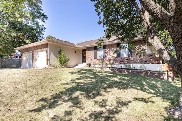 ranch-style house with a garage and a front lawn