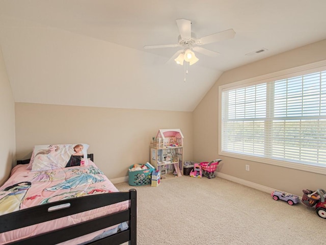 bedroom featuring ceiling fan, carpet floors, and vaulted ceiling