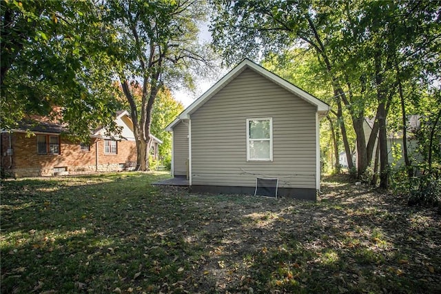 view of home's exterior featuring a lawn