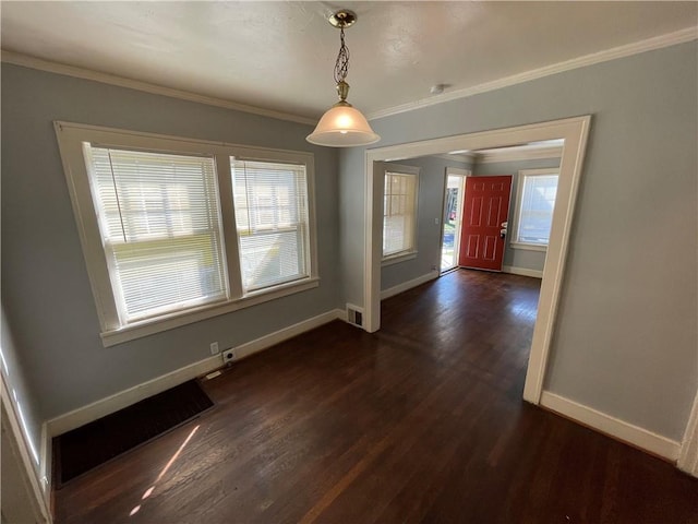 entryway with dark hardwood / wood-style floors and crown molding