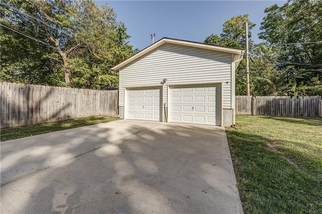 garage with a yard