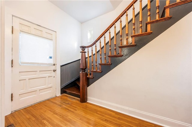 foyer entrance featuring wood-type flooring