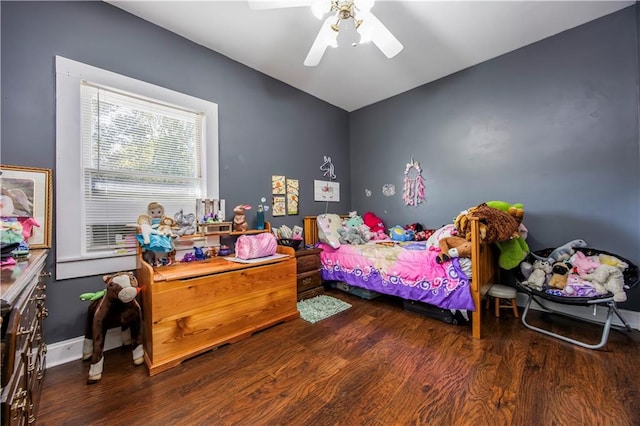 bedroom with ceiling fan and wood-type flooring