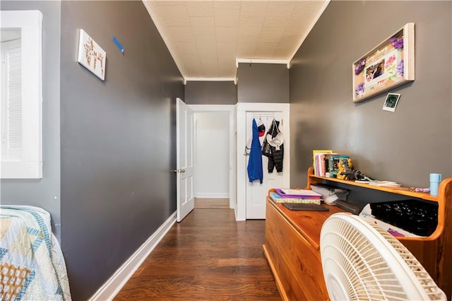 hall with dark hardwood / wood-style flooring