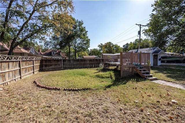 view of yard featuring a deck