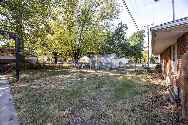 view of yard with a shed