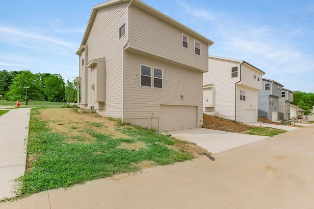 view of home's exterior with a garage