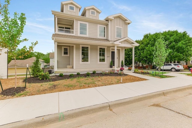 view of front of house featuring covered porch and board and batten siding