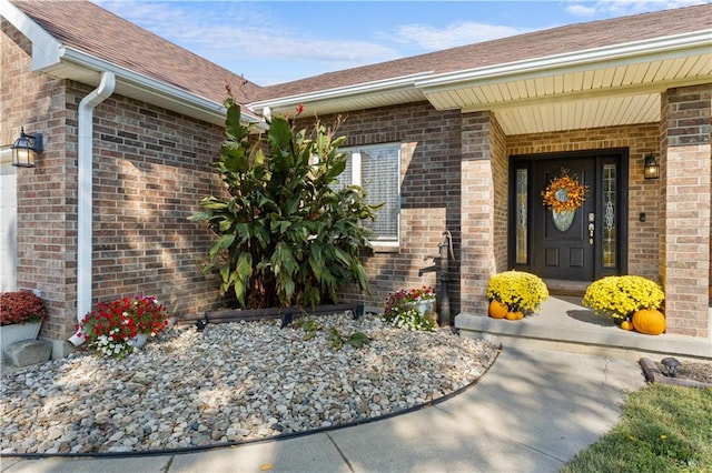 doorway to property with covered porch