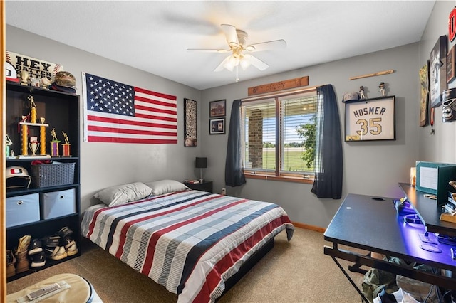 bedroom featuring ceiling fan and carpet flooring