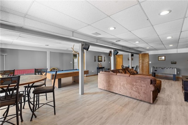 living room with hardwood / wood-style floors, pool table, and a paneled ceiling