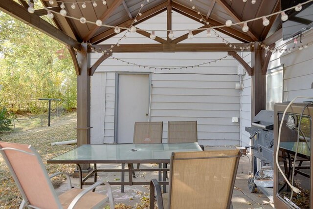 1101 Williams St, Excelsior Springs, MO 64024 - view of patio with outdoor dining area and a gazebo