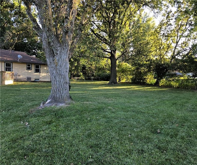 view of yard featuring central AC unit