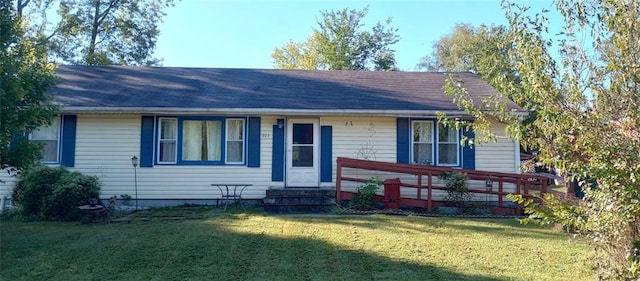 view of front of property with a front lawn