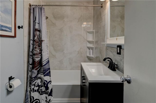 bathroom featuring vanity and shower / tub combo