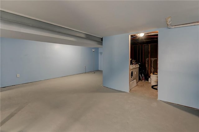 basement featuring washer and clothes dryer