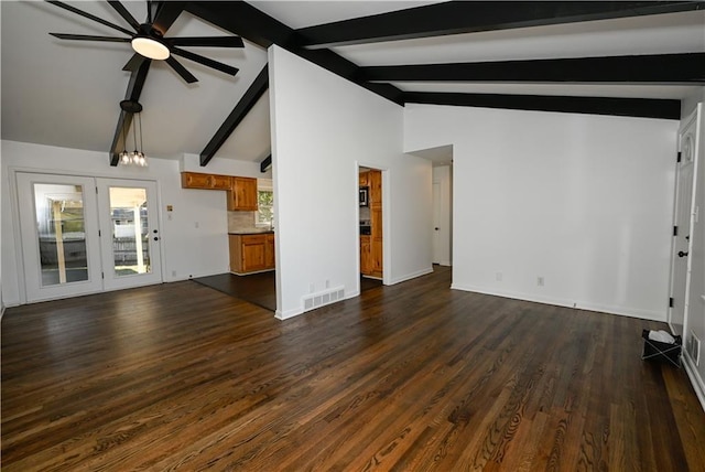 unfurnished living room featuring dark wood-type flooring, ceiling fan, and lofted ceiling with beams