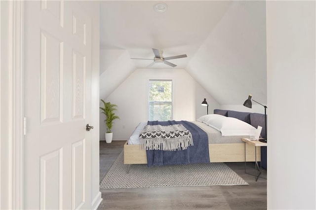 bedroom with lofted ceiling, ceiling fan, and dark hardwood / wood-style floors