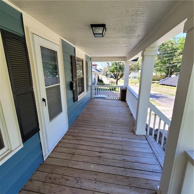 wooden deck with a porch