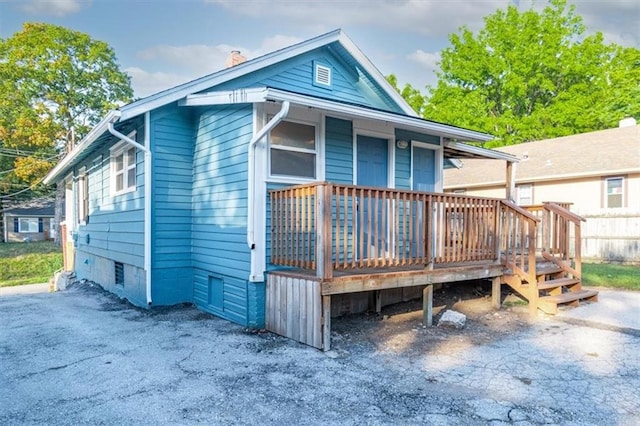 exterior space with a wooden deck