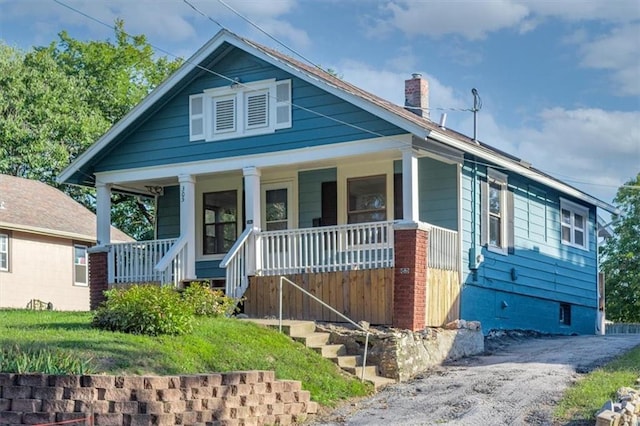 bungalow-style home with covered porch