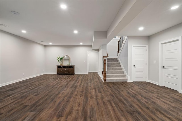 basement featuring dark hardwood / wood-style floors