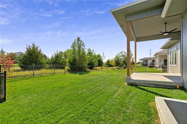 view of yard featuring ceiling fan