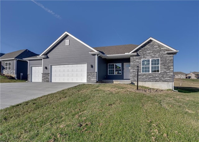 single story home with a front lawn and a garage